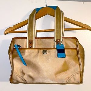 Authentic limited edition Coach gold canvas large handbag with blue trim